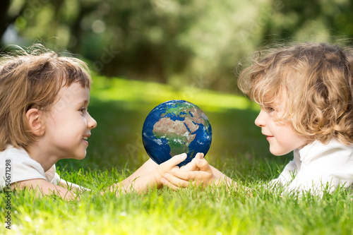 Photo: Earth in children`s hands Earth in children`s hands
