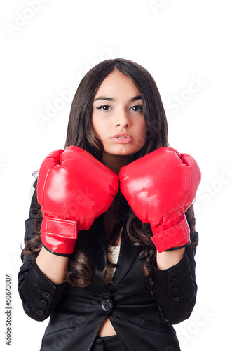 Photo: Young woman with boxing glove Young woman with boxing glove