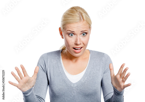 Photo: Shocked female with her mouth opened spread hands Shocked female with her mouth opened spread hands