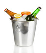 Beer bottles in ice bucket isolated on white