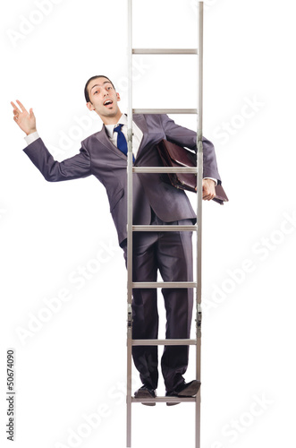 Photo: Businessman climbing the ladder isolated on white Businessman climbing the ladder isolated on white