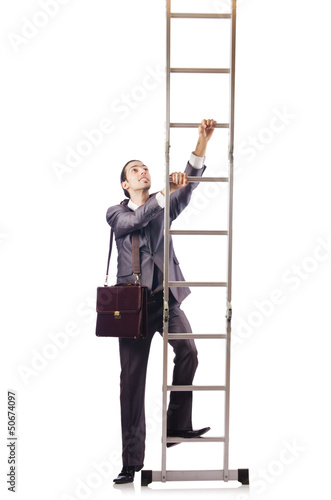 Photo: Businessman climbing the ladder isolated on white Businessman climbing the ladder isolated on white
