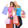 Two girl friends with shopping isolated on white