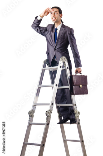 Photo: Businessman climbing career ladder on white Businessman climbing career ladder on white