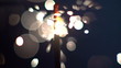 a sparkler being ignited making abstract pattern in slow motion