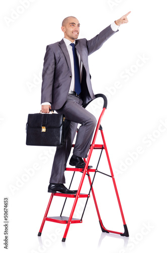 Photo: Businessman with the ladder isolated on white Businessman with the ladder isolated on white
