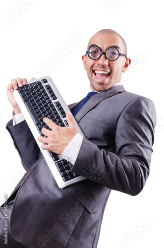 Photo: Nerd businessman with computer keyboard on white Nerd businessman with computer keyboard on white