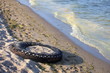 Foto: Tire on a beach Tire on a beach