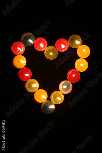 Photo: Closeup of burning candles Closeup of burning candles