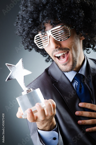 Photo: Singer receiving star prize award Singer receiving star prize award