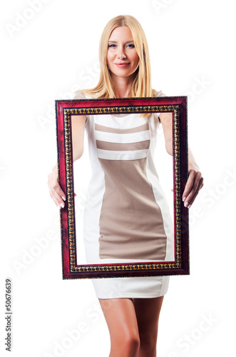 Photo: Woman with picture frame on white Woman with picture frame on white