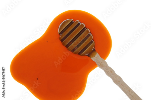 Photo: Honig und Honiglöffel im Durchlicht Honig und Honiglöffel im Durchlicht