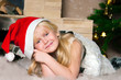The girl under the Christmas fir-tree