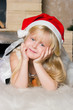 The girl under the Christmas fir-tree