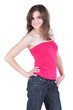 Young woman in blue jeans and in red blouse without shoulders Young woman in blue jeans and in red blouse without shoulders
