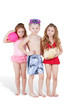 Boy and two girls in beach suits, boy with swimming mask