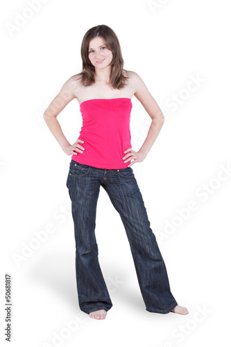 Photo: Young barefooted woman in blue jeans and in red blouse Young barefooted woman in blue jeans and in red blouse