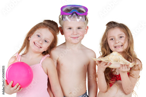 Photo: Half-length portrait of boy and two girls in beach suits Half-length portrait of boy and two girls in beach suits