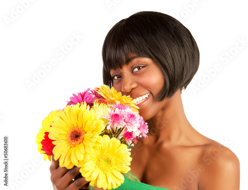 Photo: African woman with spring flowers African woman with spring flowers