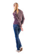 back view of standing young beautiful  blonde woman