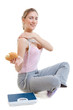 woman eats burger thinking about Weight loss