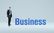 Illustration: Businessman stand near word business. Businessman stand near word business.
