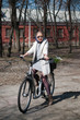Photo: young woman riding a bicycle young woman riding a bicycle