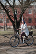 Photo: young woman riding a bicycle young woman riding a bicycle