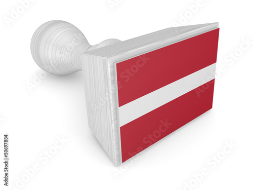 Photo: Wooden stamp with latvian flag. Wooden stamp with latvian flag.
