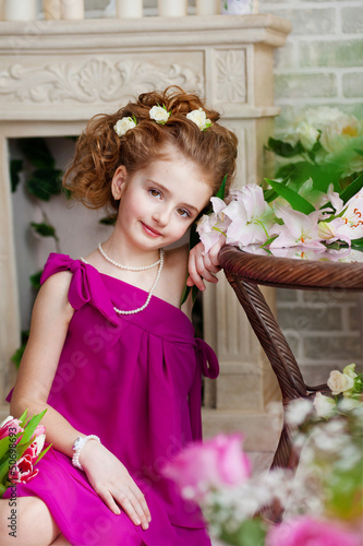 Photo: Portrait of a beautiful girl with flowers Portrait of a beautiful girl with flowers