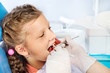 Grl in a dentist's chair