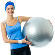 Foto : Cheerful smiling woman with fitball, over white Cheerful smiling woman with fitball, over white