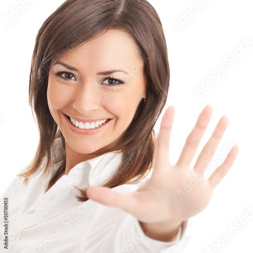 Photo: Young happy gesturing businesswoman, isolated Young happy gesturing businesswoman, isolated