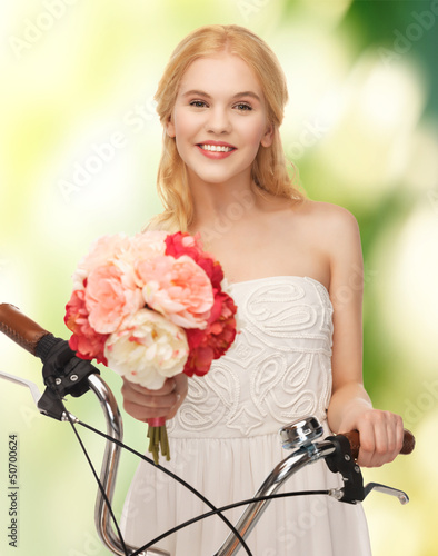 Photo: country girl with bicycle and flowers country girl with bicycle and flowers