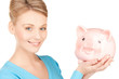 lovely woman with big piggy bank