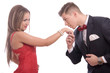 Man kissing the hand of his beautiful lady on white background