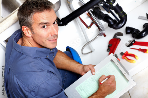Photo: Plumber. Plumber.