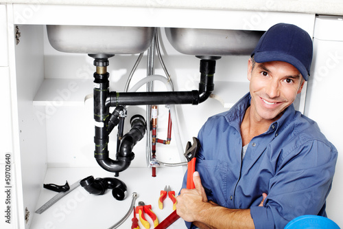 Photo: Plumber. Plumber.