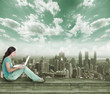 Photo: Young woman with laptop computer. Young woman with laptop computer.