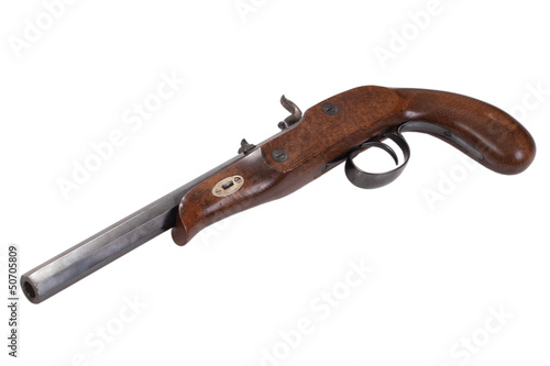 Photo: Old duel pistol isolated on white background Old duel pistol isolated on white background