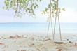 Photo: Wood swing on beach Wood swing on beach