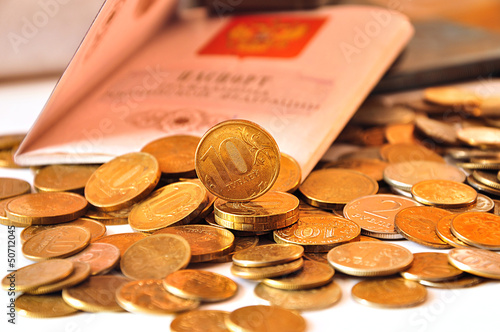 Photo: coins and passport coins and passport