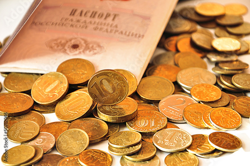 Photo: coins and passport coins and passport