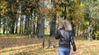pretty woman walk sit  amazing autumn park bench covered leaves
