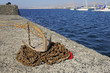 anchor and rusty chain on pier
