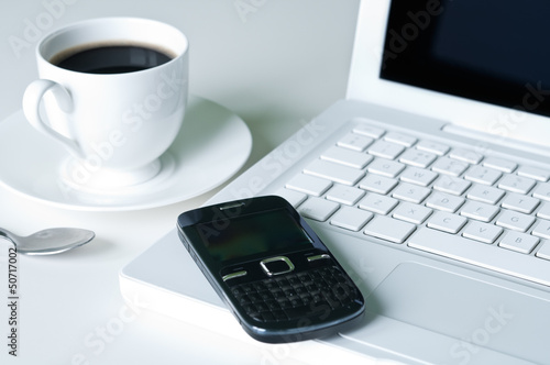 Photo: Laptop and Coffee Cup Laptop and Coffee Cup