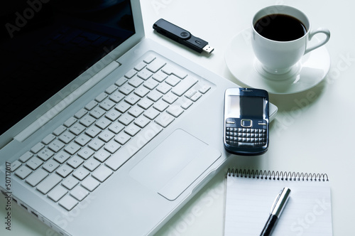 Photo: Laptop and Coffee Cup Laptop and Coffee Cup