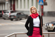 Young woman walking on the city street