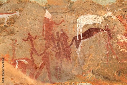 Photo: Bushmen (san) rock painting of figures and antelopes Bushmen (san) rock painting of figures and antelopes
