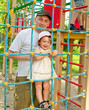 father with daughter on playing field
